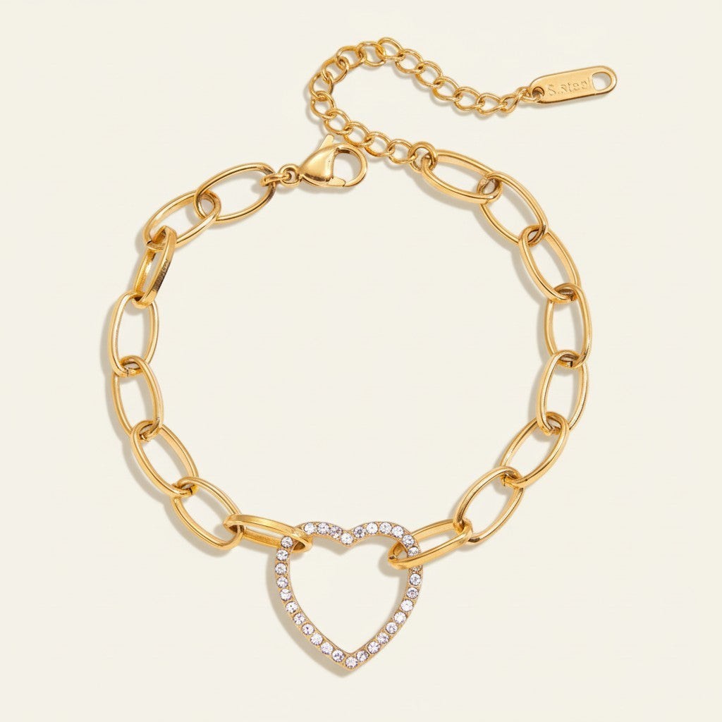 Seraphina Treasures gold-tone link bracelet with crystal-encrusted heart pendant.