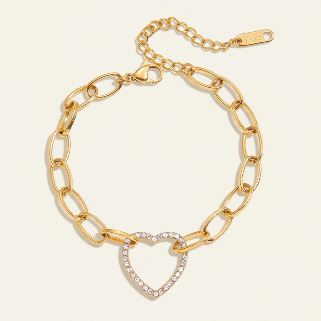 Seraphina Treasures gold-tone link bracelet with crystal-encrusted heart pendant.