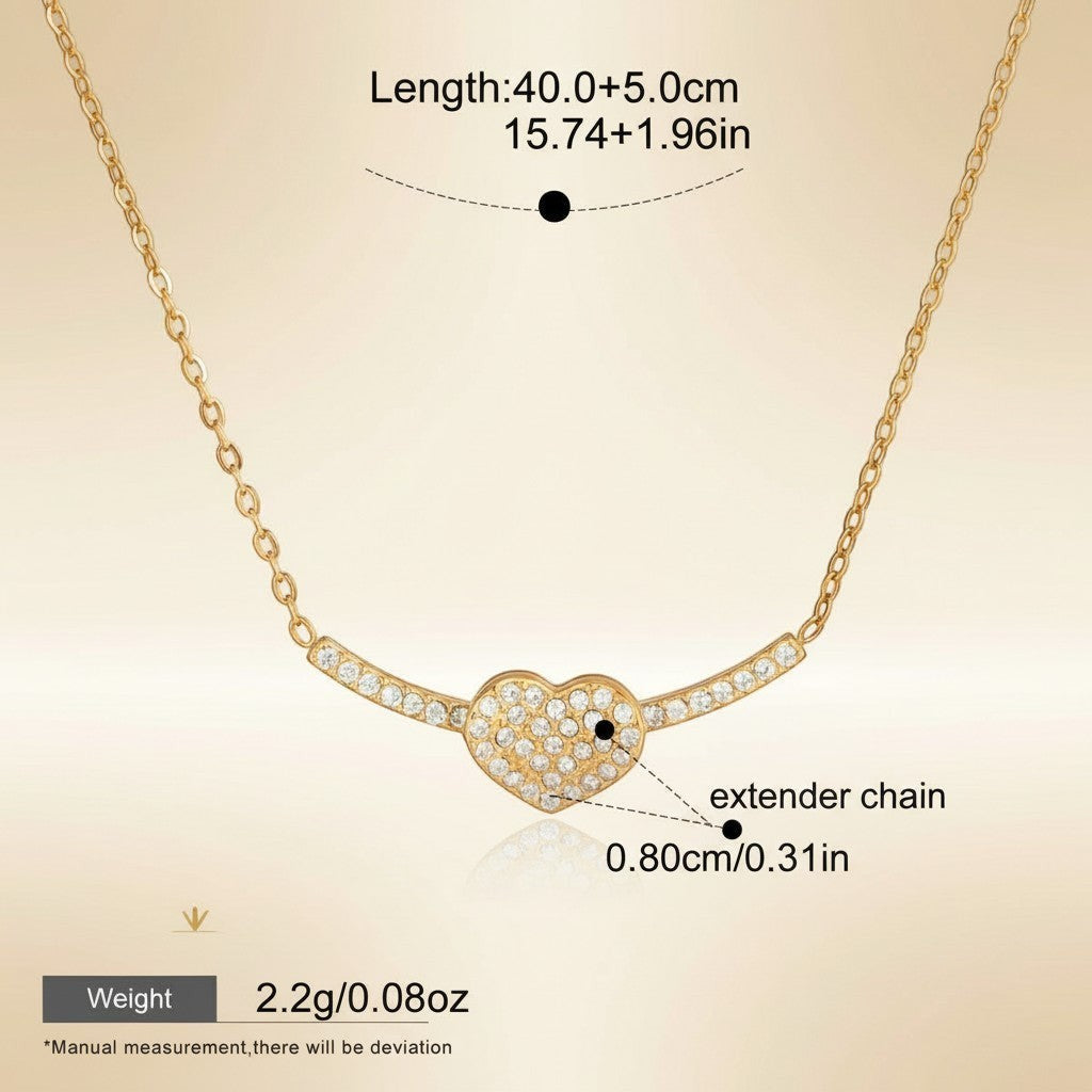 Seraphina Treasures gold-tone necklace with a crystal-encrusted heart pendant and extender chain. Hypoallergenic.