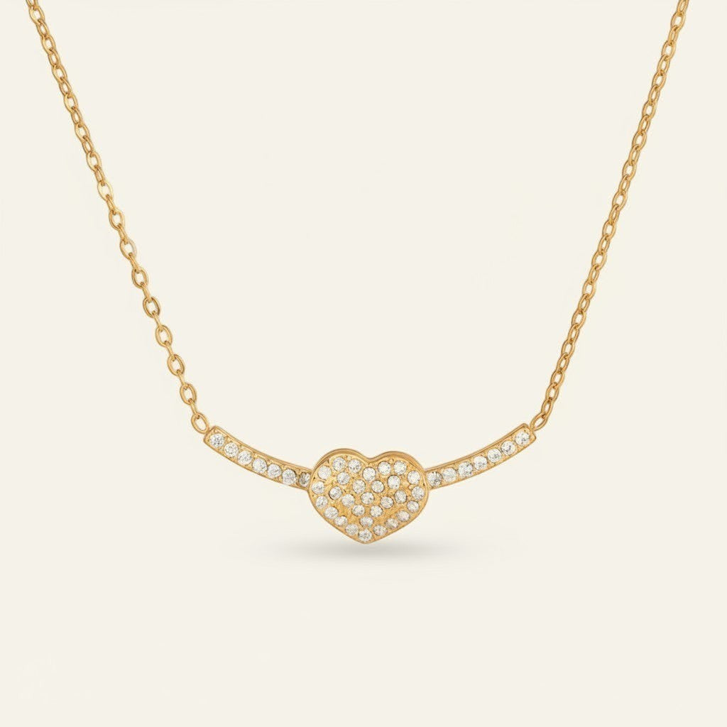 Seraphina Treasures gold necklace with a crystal-encrusted heart pendant and delicate chain.