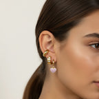 Seraphina Treasures gold hoop earrings with heart charms and zirconia accents, plus a gold ear cuff.