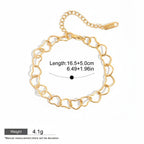 Seraphina Treasures gold-tone stainless steel bracelet with interlocking heart links. Adjustable chain.
