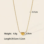 Seraphina Treasures gold heart necklace with a delicate snake chain. Pendant measures 0.9cm.