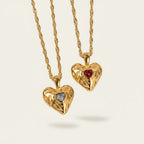Seraphina Treasures gold heart necklace with cubic zirconia and ruby gemstone accents.