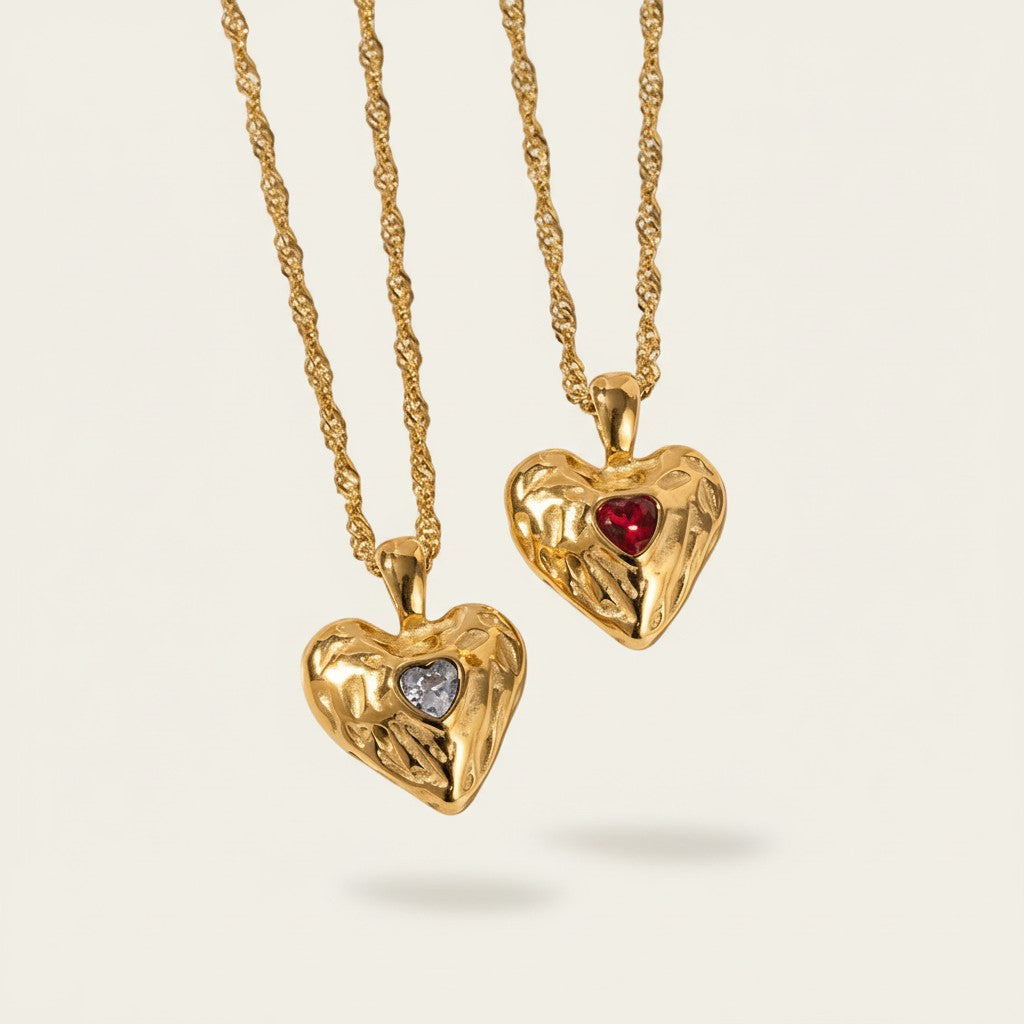 Seraphina Treasures gold heart necklace with cubic zirconia and ruby gemstone accents.