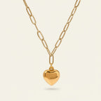 Seraphina Treasures Aureline necklace with a gold heart pendant and silver chain. Elegant, symbolic jewelry.