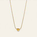 Seraphina Treasures gold heart pendant necklace with delicate chain, perfect for everyday wear.