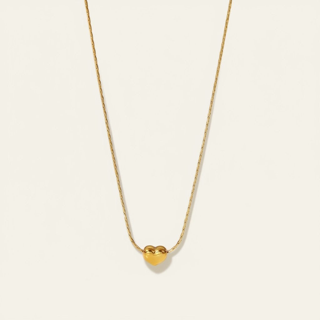 Seraphina Treasures gold heart pendant necklace with delicate chain, perfect for everyday wear.