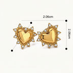 Seraphina Treasures gold heart stud earrings with clear crystal accents, featuring a sunburst-like border.