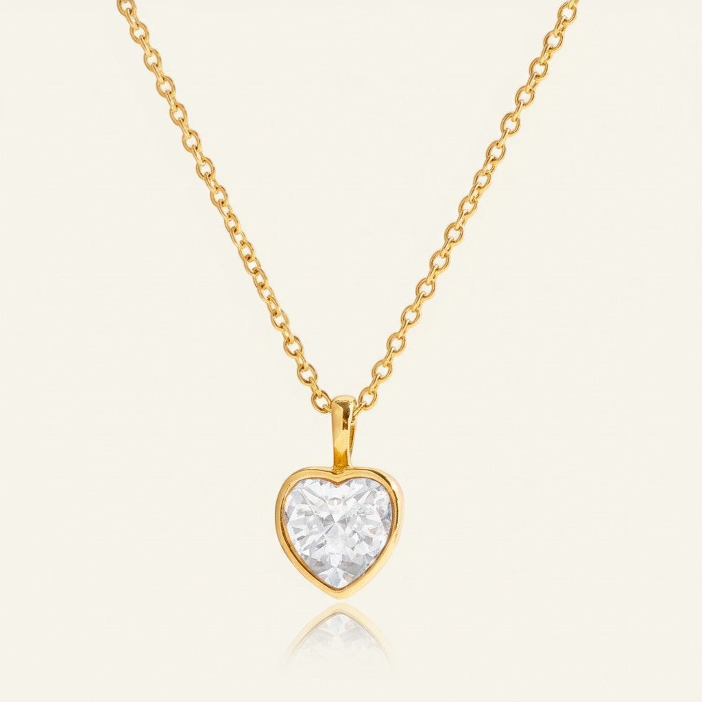 Seraphina Treasures gold necklace with a heart-shaped clear zircon pendant. Elegant and timeless.