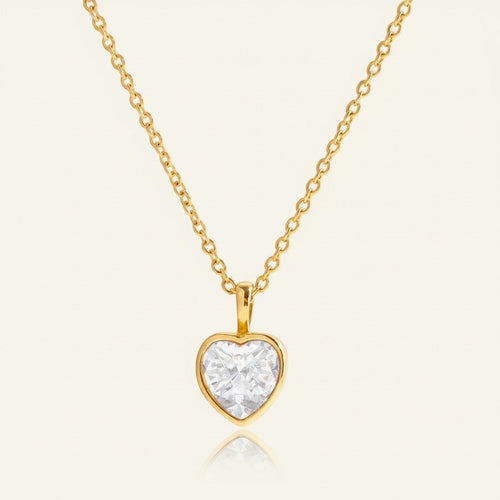 Seraphina Treasures gold necklace with a heart-shaped clear zircon pendant. Elegant and timeless.