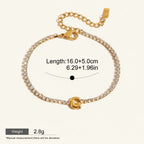 Seraphina Treasures gold-tone bracelet with clear zirconia stones and a gold initial 'G' pendant. Adjustable chain.