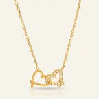 Seraphina Treasures gold-tone necklace with two intertwined hearts, one plain and one paved with clear crystals.