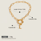 Seraphina Treasures gold-tone chain bracelet with a toggle clasp and a dangling initial 'L' charm. Waterproof and hypoallergenic.