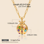 Seraphina Treasures gold ladybug necklace with colorful cubic zirconia stones and extender chain. Hypoallergenic.