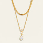 Seraphina Treasures gold layered necklace with snake chain and teardrop pendant with cubic zirconia.