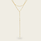 Seraphina Treasures gold layered Y-necklace with delicate chain links, perfect for adding modern elegance.