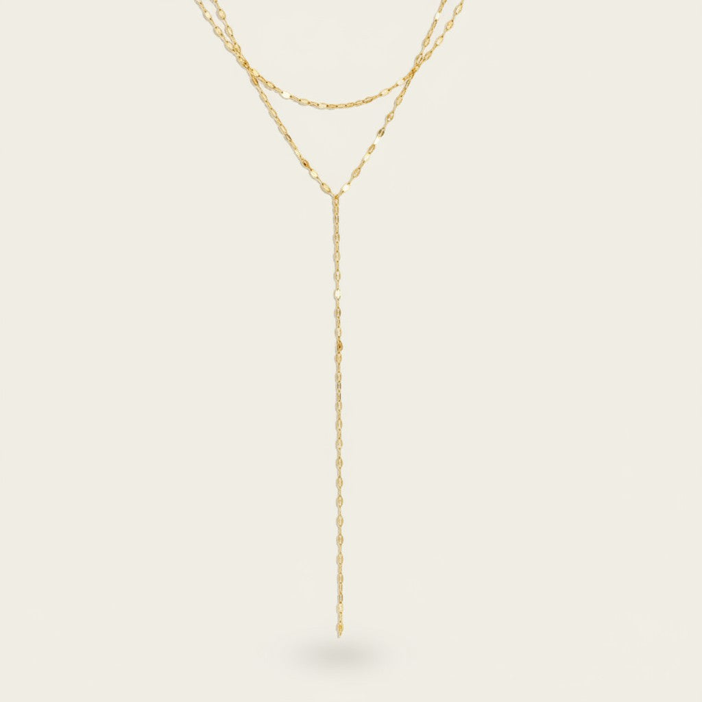 Seraphina Treasures gold layered Y-necklace with delicate chain links, perfect for adding modern elegance.