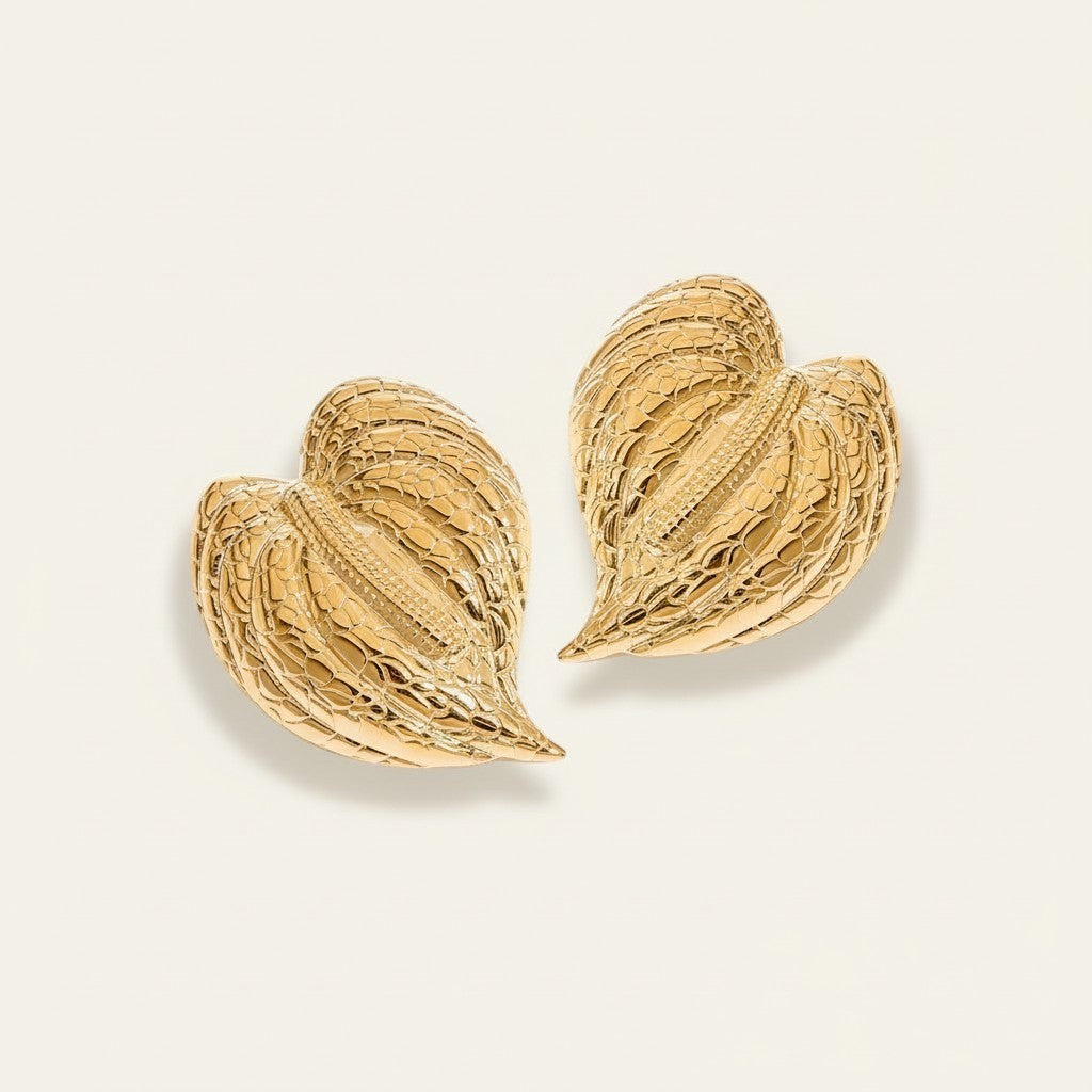 Seraphina Treasures Elowen gold leaf earrings with textured detail. Lightweight statement earrings.