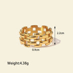 Seraphina Treasures Valora gold-tone stainless steel open link ring with a woven design. Measures 2.2cm wide.