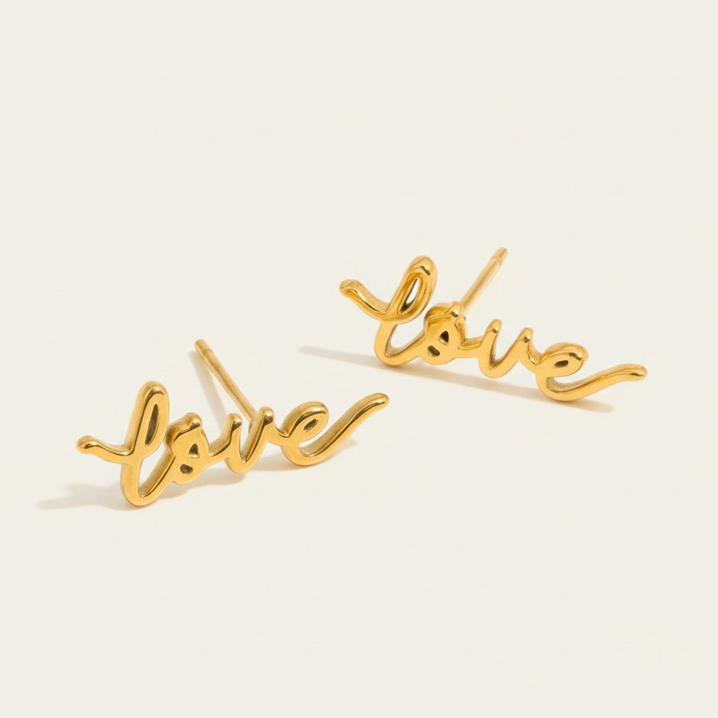 Seraphina Treasures gold plated "love" script stud earrings. Romantic script design.
