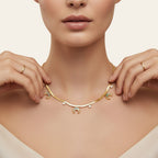 Seraphina Treasures gold serpentine chain necklace with crescent moon and round crystal pendants.