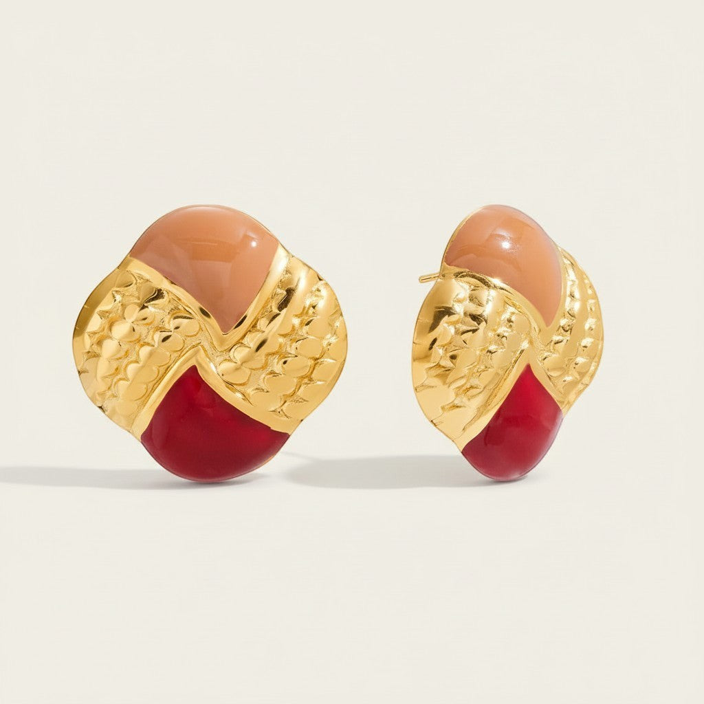 Seraphina Treasures gold earrings with peach and red enamel, featuring an oil drip pattern.
