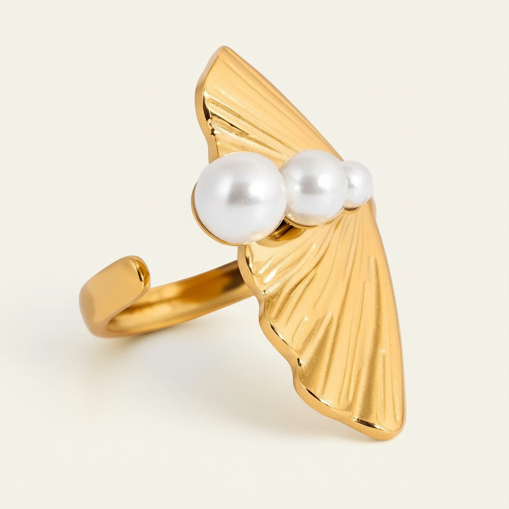 Seraphina Treasures gold open band ring with three white pearls on a fan-shaped, ribbed design.