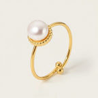 Seraphina Treasures gold ring with a single lustrous natural pearl and open design.