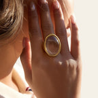 Seraphina Treasures gold oval ring with clear resin stone. Statement cocktail ring.