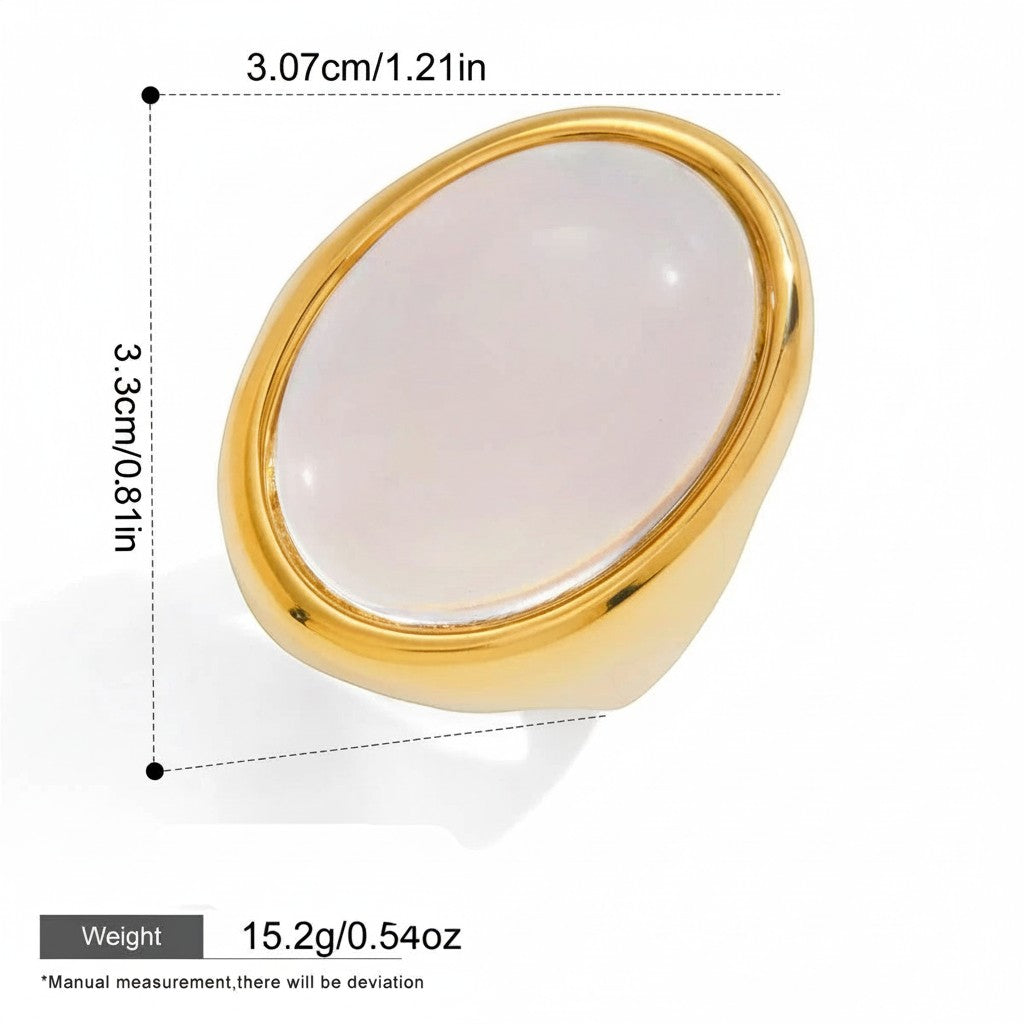 Seraphina Treasures gold oval resin ring with a clear, glowing white stone. Waterproof and hypoallergenic.