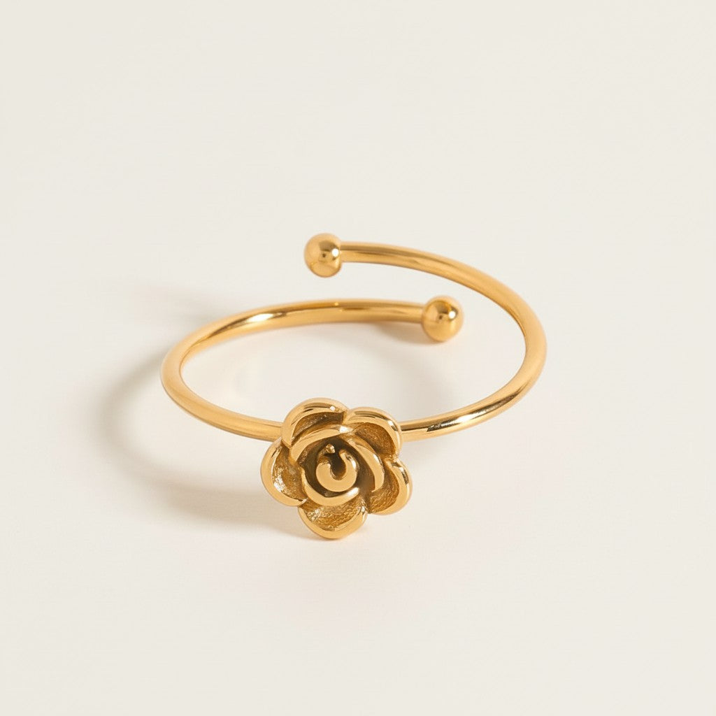 Seraphina Treasures gold-tone adjustable ring with a delicate rose flower design. Elegant floral statement jewelry.