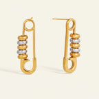 Seraphina Treasures Erebryn gold safety pin earrings with stacked gold and silver beads.