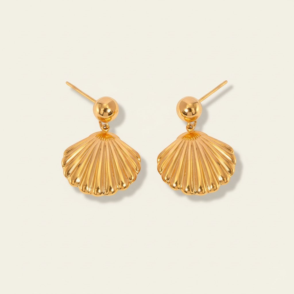 Seraphina Treasures gold-tone shell drop earrings with a polished finish. Lightweight and elegant.