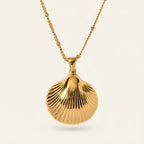 Seraphina Treasures gold shell pendant necklace with beaded chain, inspired by nature.