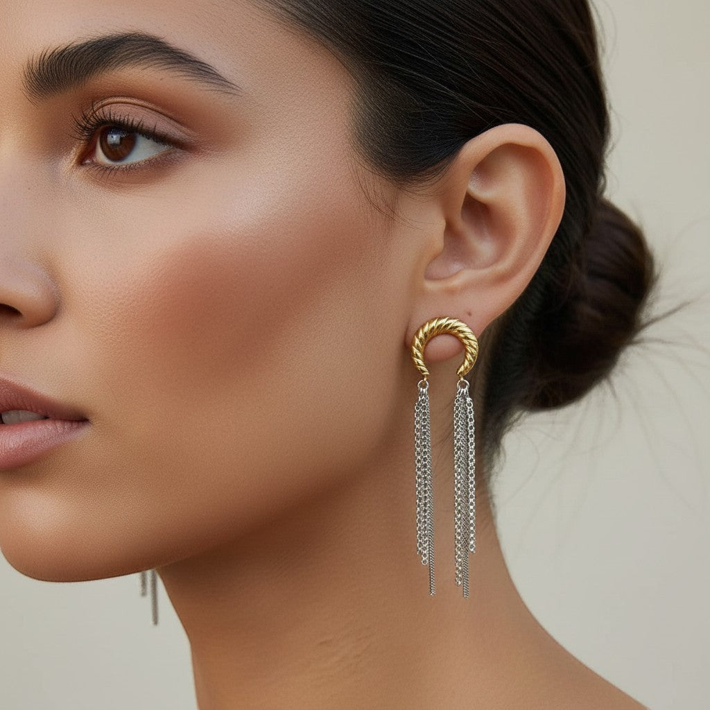 Seraphina Treasures gold and silver metal drop earrings with chain tassels.