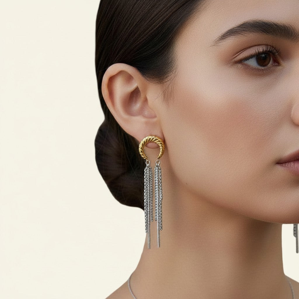 Seraphina Treasures gold and silver metal dangle earrings with chain tassels and twisted hoop.