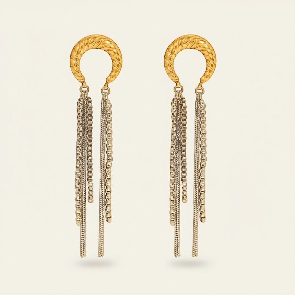 Seraphina Treasures gold crescent moon earrings with silver chain tassels. Elegant, lightweight, bohemian style.