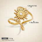 Seraphina Treasures gold spiral sun ring with a central clear stone, featuring a celestial-inspired design.