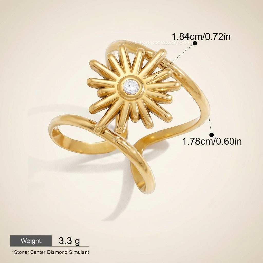 Seraphina Treasures gold spiral sun ring with a central clear stone, featuring a celestial-inspired design.