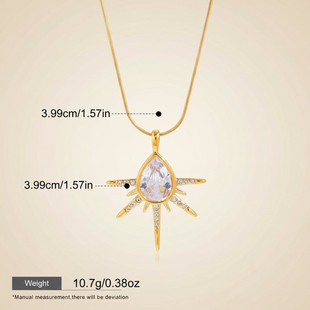 Seraphina Treasures gold teardrop necklace with cubic zirconia starburst pendant. Adjustable chain.