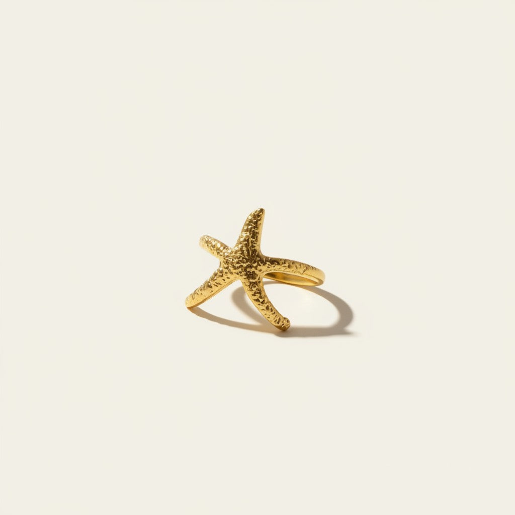 Seraphina Treasures Amaryllis gold starfish ring with textured, ocean-inspired design.