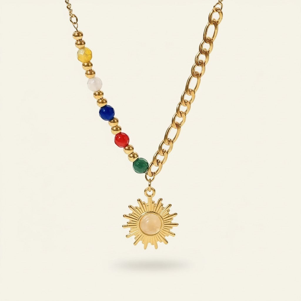 Seraphina Treasures gold-tone necklace with a sun pendant, colorful beads, and a chunky chain.