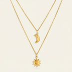 Seraphina Treasures gold layered necklace with hammered sun and moon charms. Minimalist celestial jewelry.