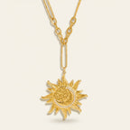 Seraphina Treasures gold sun and moon necklace with crystal accents. Celestial-inspired statement jewelry.