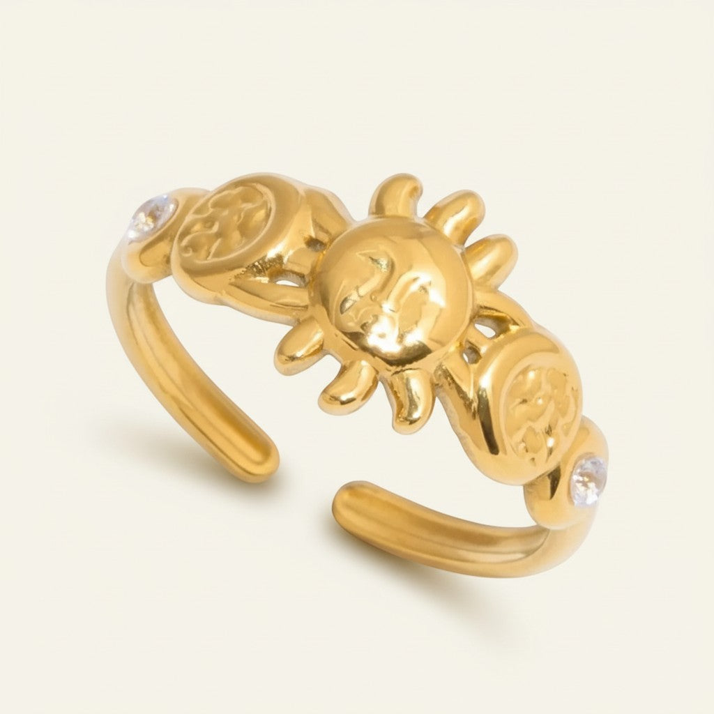 Seraphina Treasures gold adjustable ring with sun, moon, and cubic zirconia details.