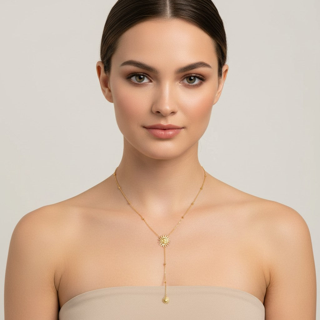 Seraphina Treasures Grainne necklace with two gold sun charms and beaded chain, perfect for adding a cheerful touch.