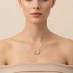 Seraphina Treasures gold-tone sun pendant necklace with clear zirconia stones and adjustable chain.