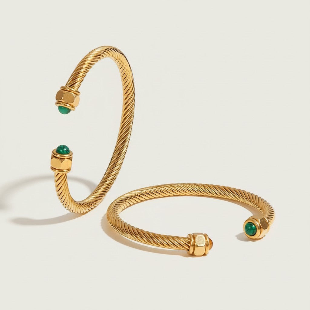 Seraphina Treasures gold twisted cuff bracelet with malachite and tiger's eye accents. Textured ribbed design.