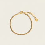 Seraphina Treasures gold-tone stainless steel Vedara bracelet with adjustable clasp and disc charm.